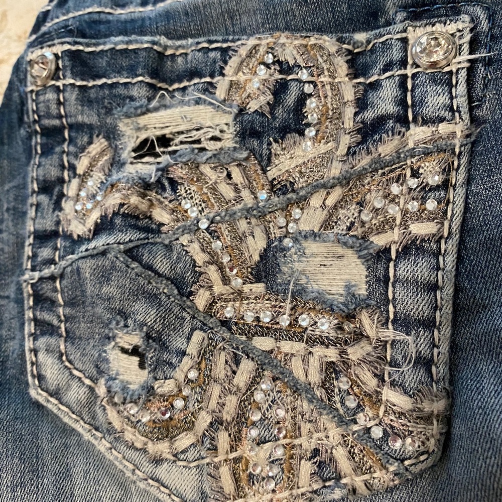 Buckle jeans: Miss Me skinny